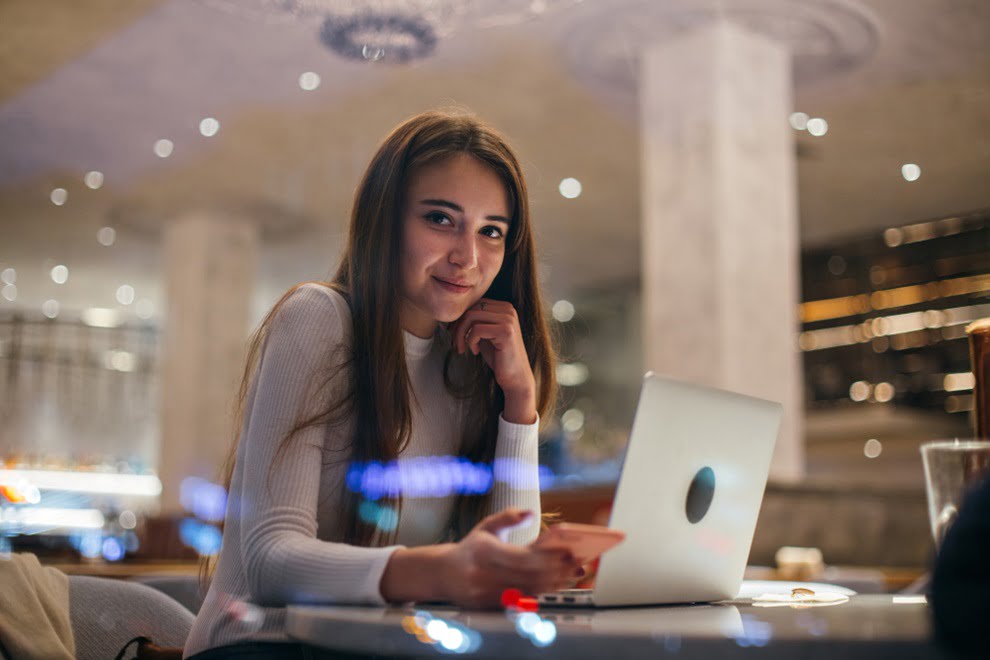 cute-girl-works-laptop-hipster-cafe